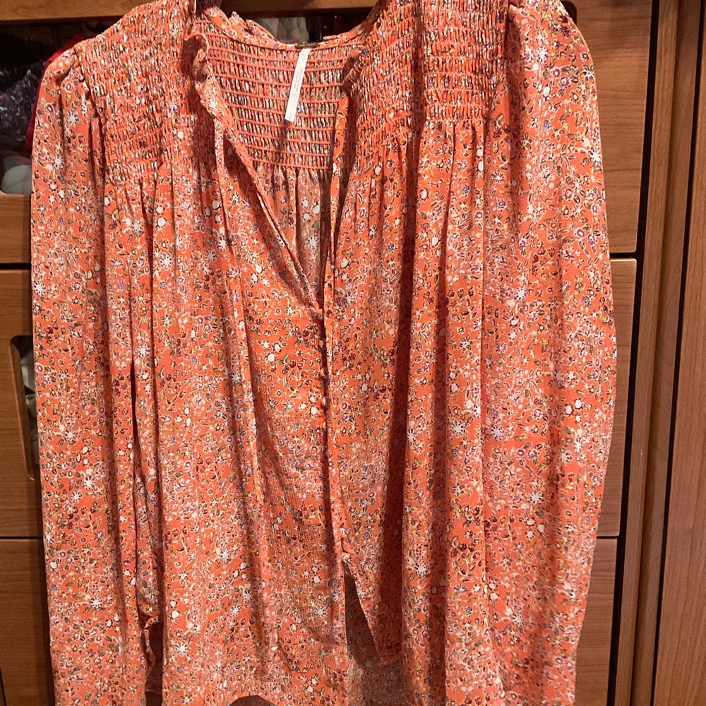 Free People. Floral top, very light and comfy. Never worn.